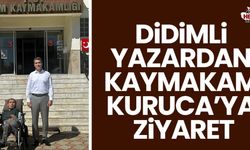 Didimli yazardan Kaymakam Kuruca’ya ziyaret