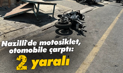 Nazilli'de motosiklet, otomobile çarptı: 2 yaralı