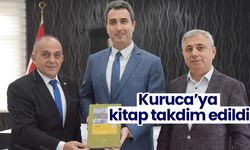 Kuruca’ya kitap takdim edildi