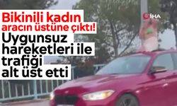 Bikinili kadın aracın üstüne çıktı! Uygunsuz hareketleri ile trafiği alt üst etti
