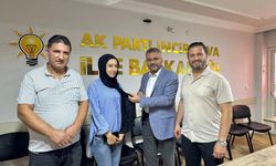 AK Partili Özmen İncirliova'da! Partiye katılan üyelere rozet taktı