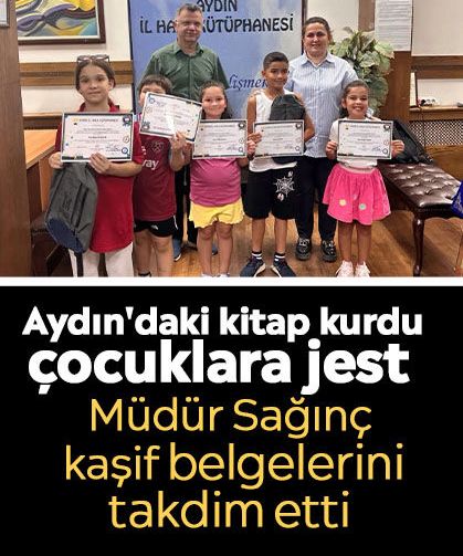 Aydın'daki kitap kurdu çocuklara jest: Müdür Sağınç kaşif belgelerini takdim etti